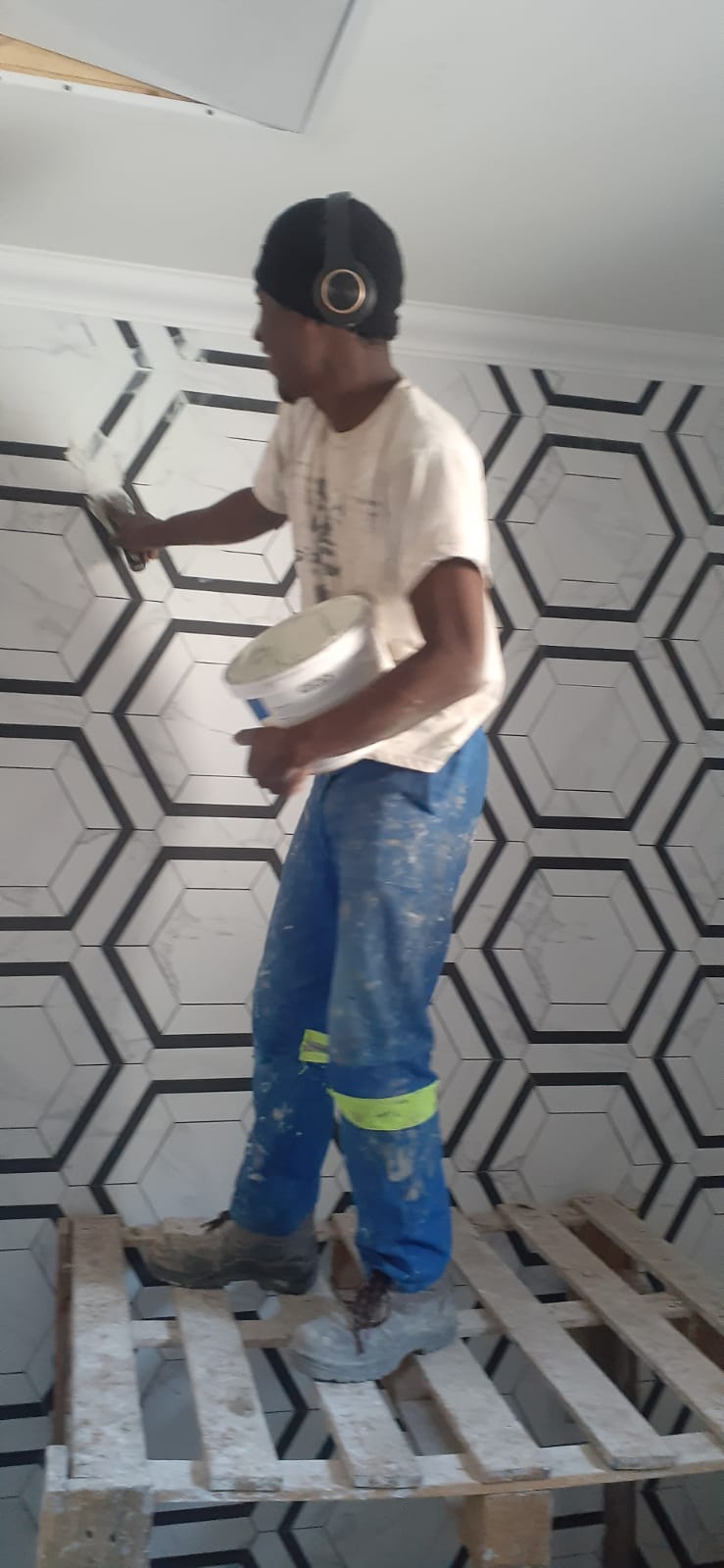 Craftsman Installing Hexagon Tiles